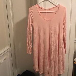 Women’s size small pink tunic with pockets